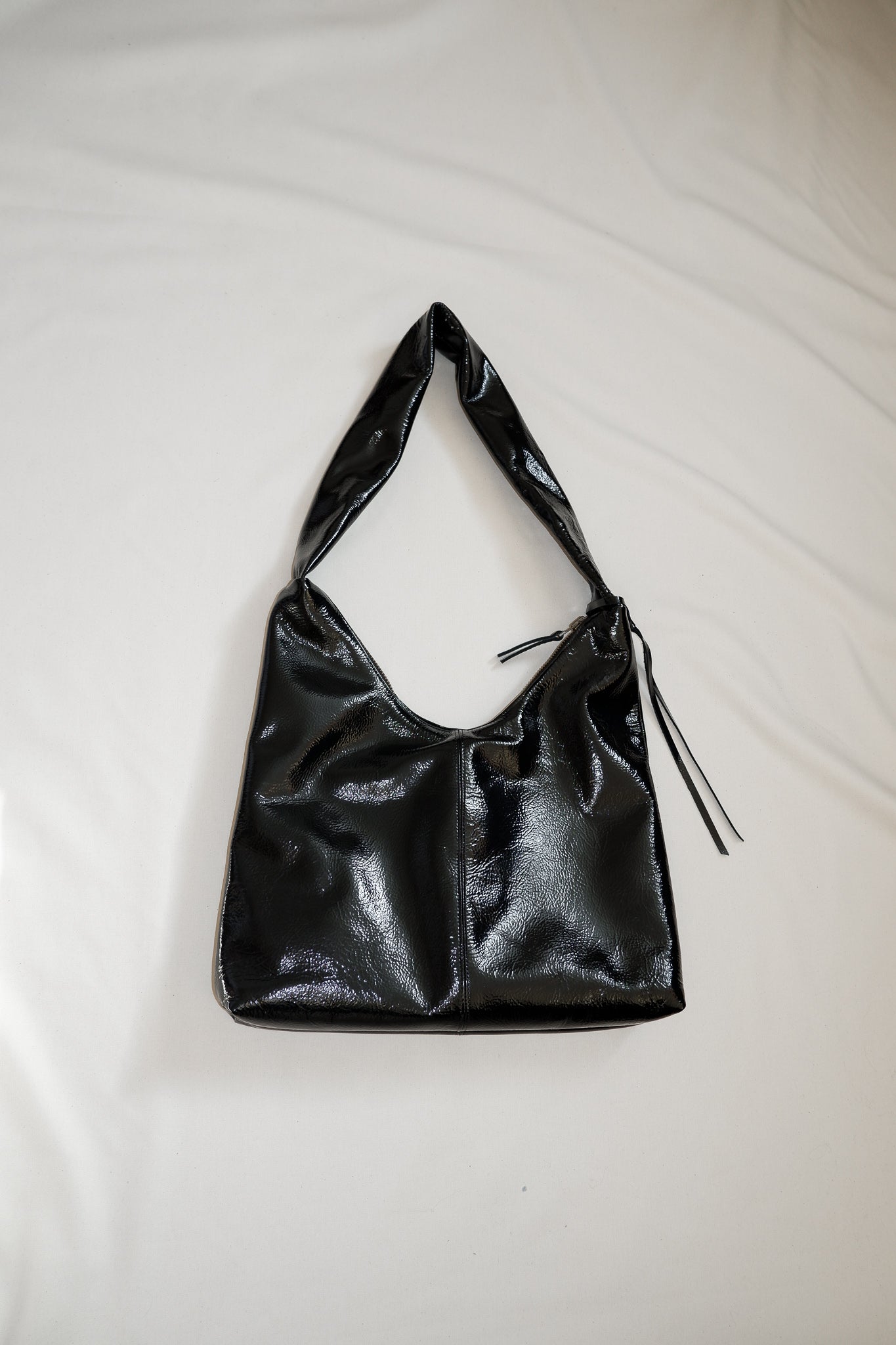 nona - m crossbody bag - crushed patent black