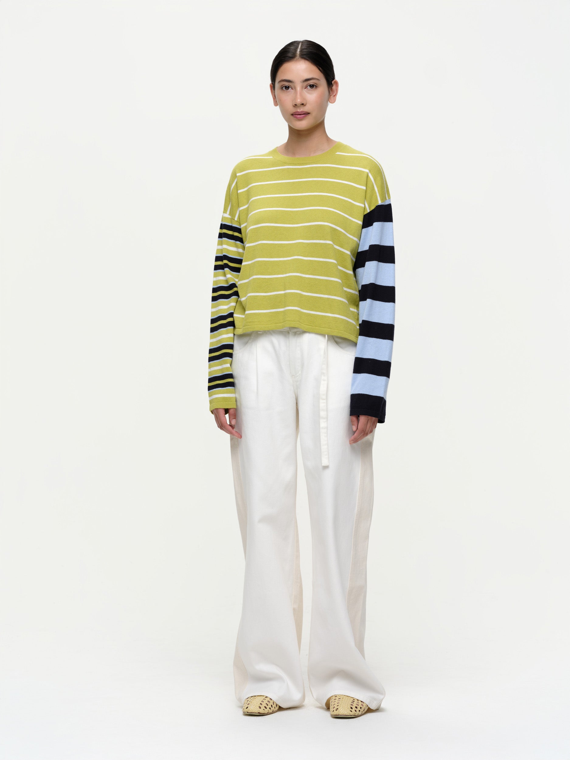 Striped knit sweater in a soft cotton cashmere blend, featuring bold seasonal colours, contrasting sleeve details, and a clean straight fit.