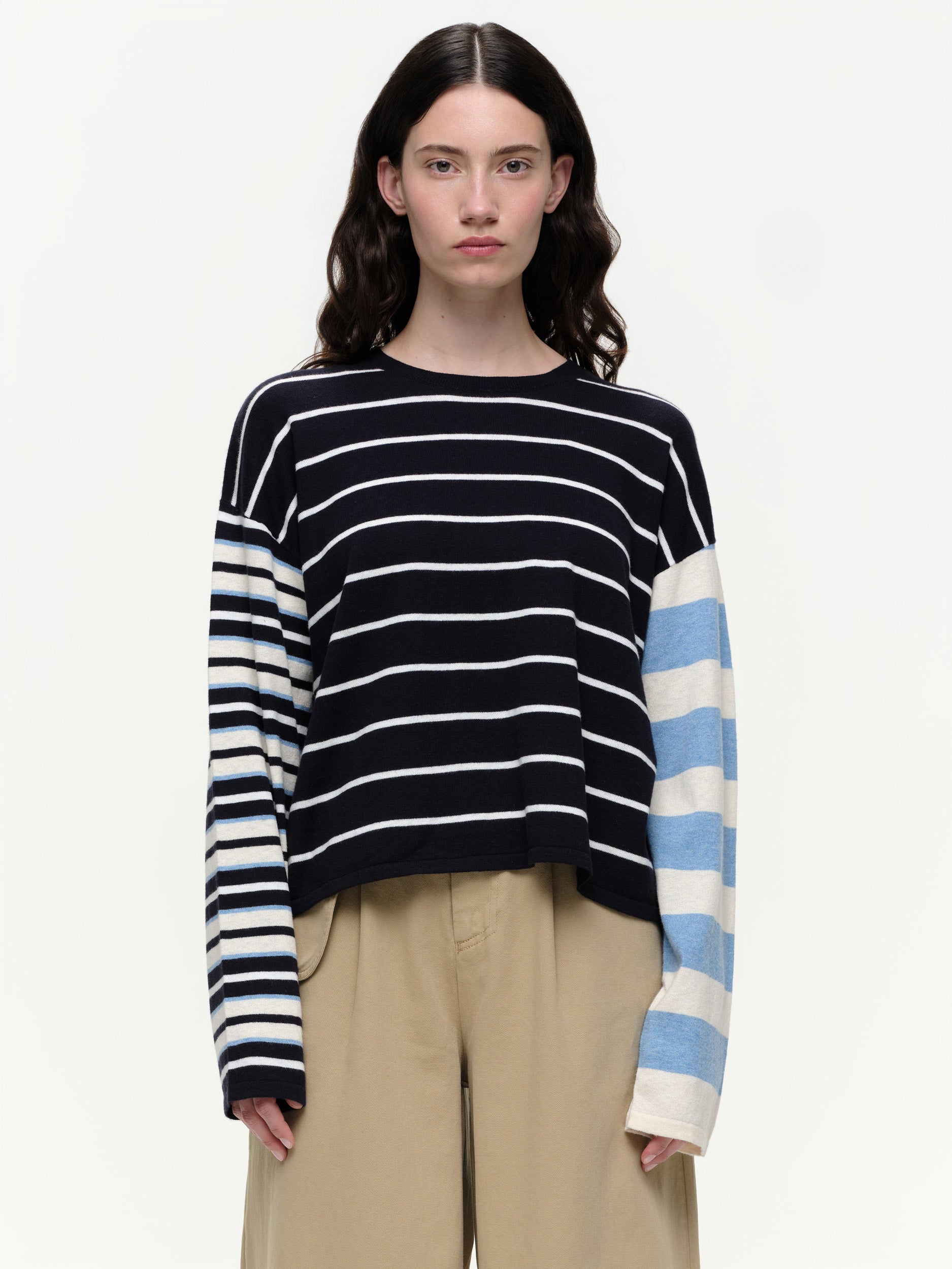 Striped knit sweater in a soft cotton cashmere blend, featuring bold seasonal colours, contrasting sleeve details, and a clean straight fit.
