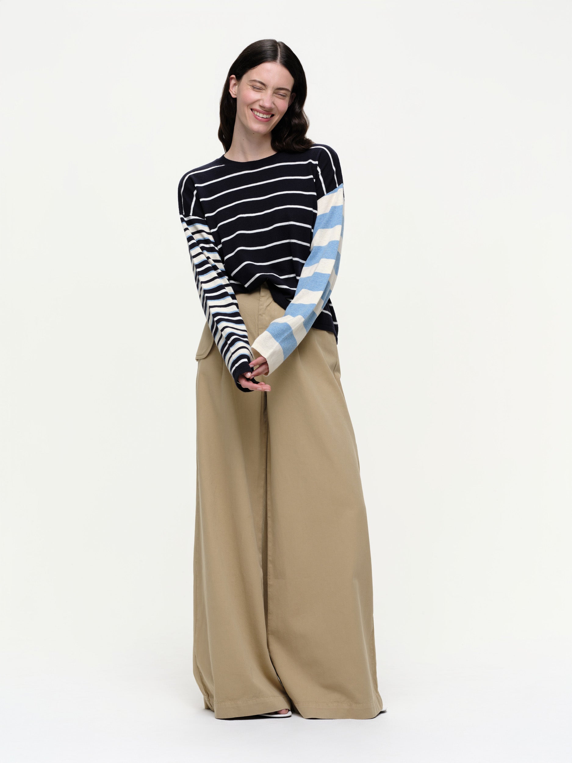 Striped knit sweater in a soft cotton cashmere blend, featuring bold seasonal colours, contrasting sleeve details, and a clean straight fit.