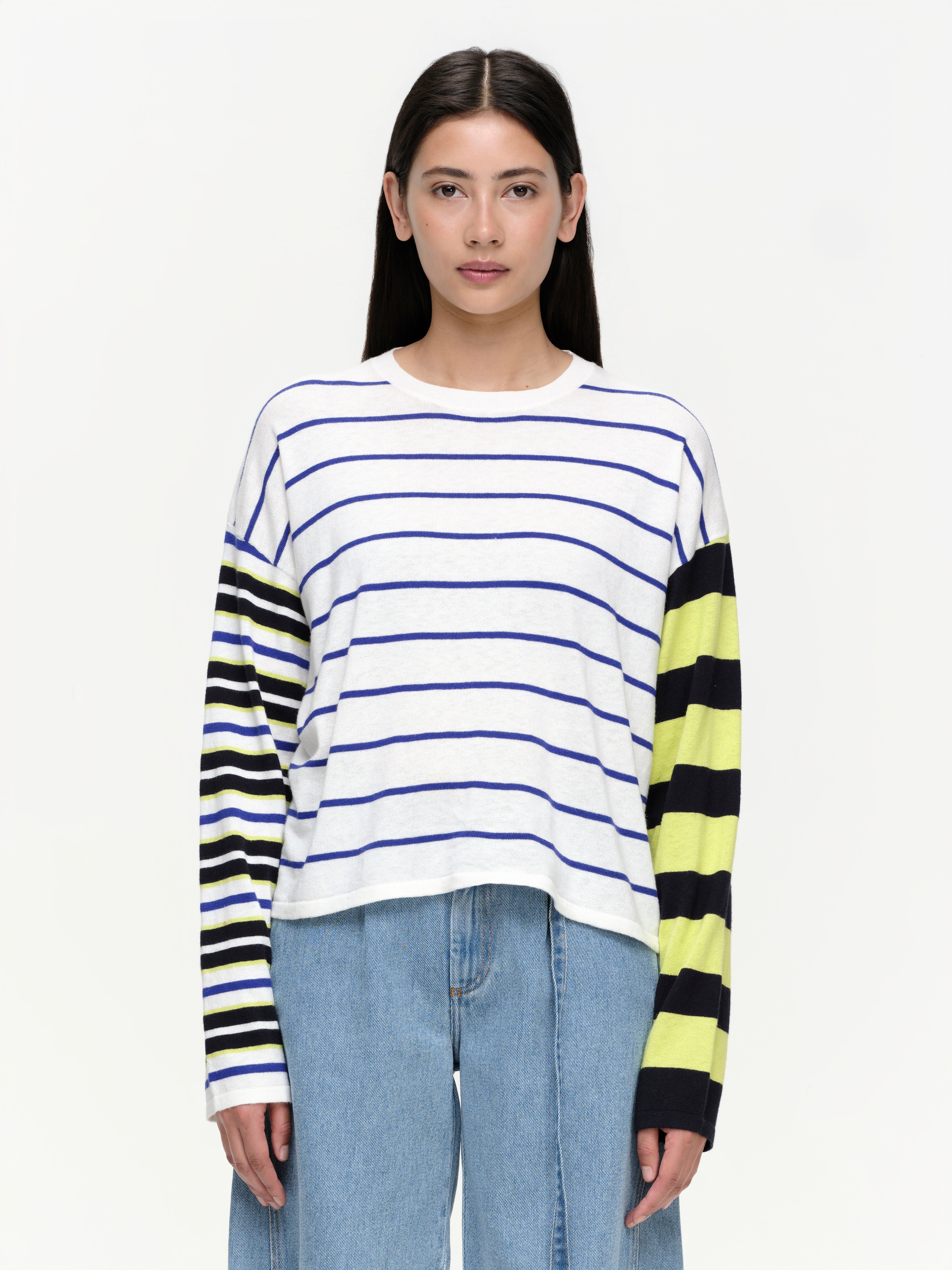 Striped knit sweater in a soft cotton cashmere blend, featuring bold seasonal colours, contrasting sleeve details, and a clean straight fit.