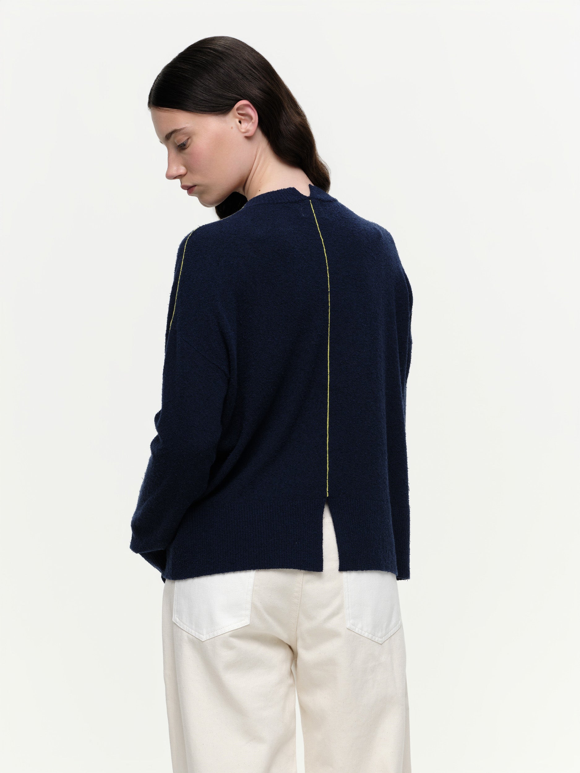 Lightweight bouclé knit summer sweater with a relaxed fit, featuring contrast stripe detailing at the back and sleeves and wide ribbed cuffs.